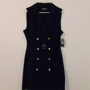 Is sleeveless navy double breasted dress with belt